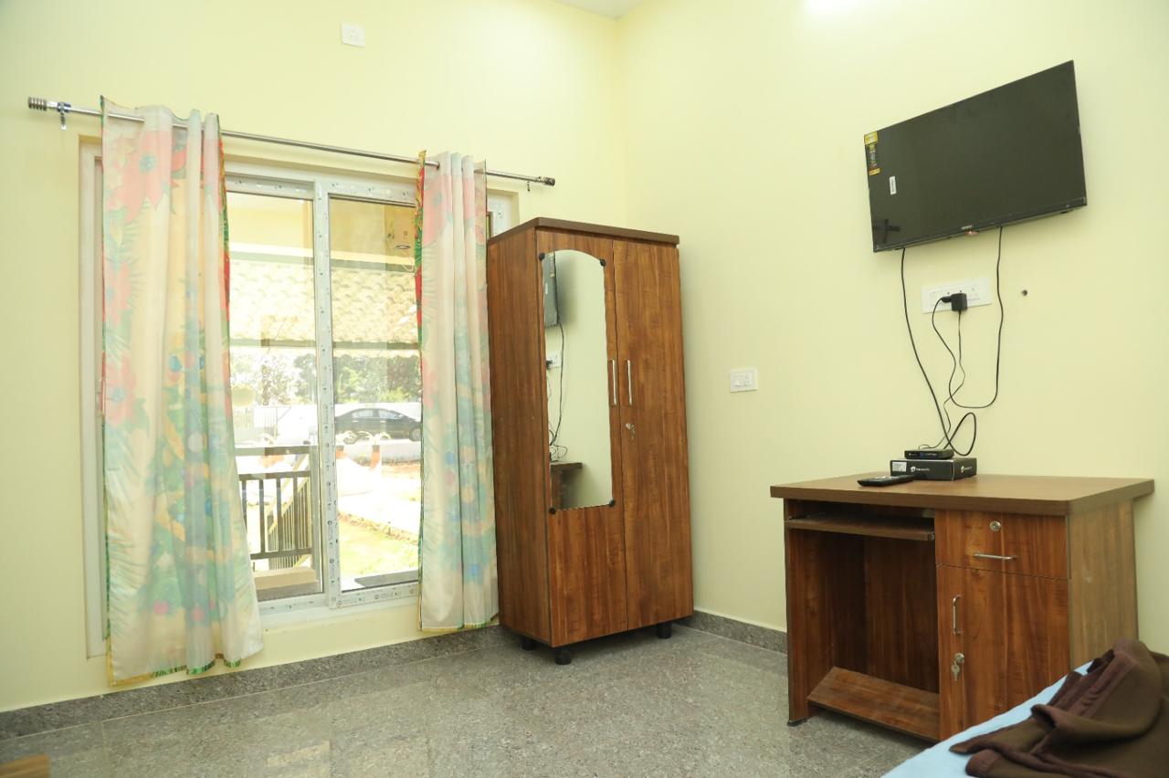 Bedroom with Balcony View, Wardrobe & Smart TV